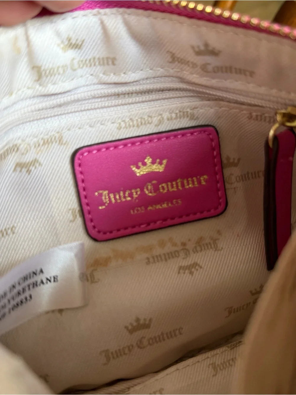 Juicy Couture Pink Quilted Bow Wristlet with Gold Plaque